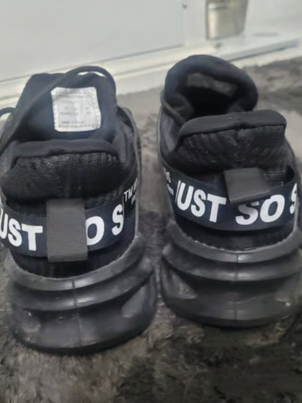 Black sneakers, lightweight walking shoes